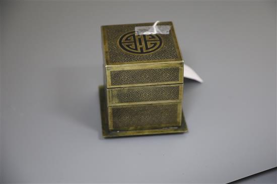 A Chinese bronze shou three tier square box, 19th century, H.10.3cm